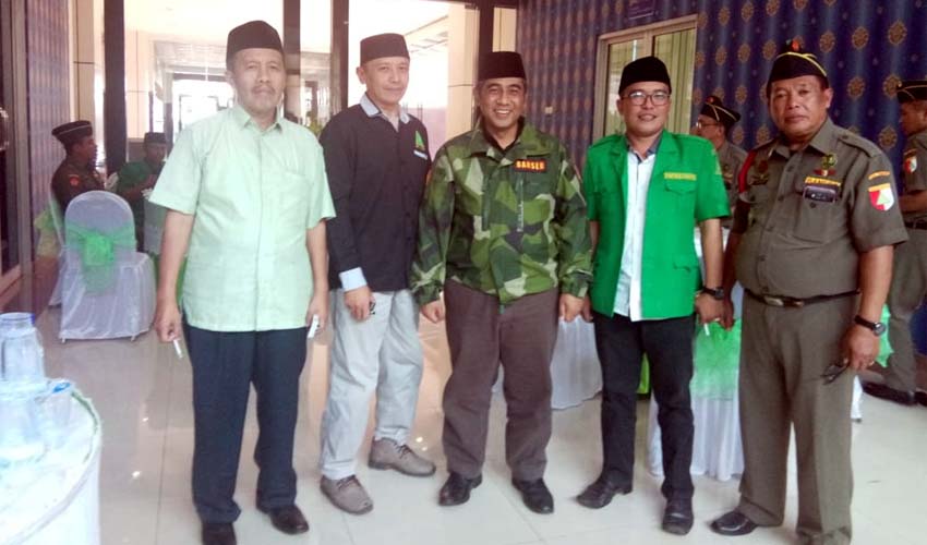 Kasatkorwil Banser Jawa Timur Irsyad Yusuf Bersama Ketua Dewan Penasehat PC GP Ansor Kabupaten Malang, Hasan Abadi. (ist)